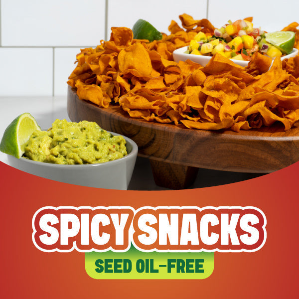 Bag of Jackson's Spicy Jalapeño Kettle Chips made with avocado oil served with guacamole on a wooden board