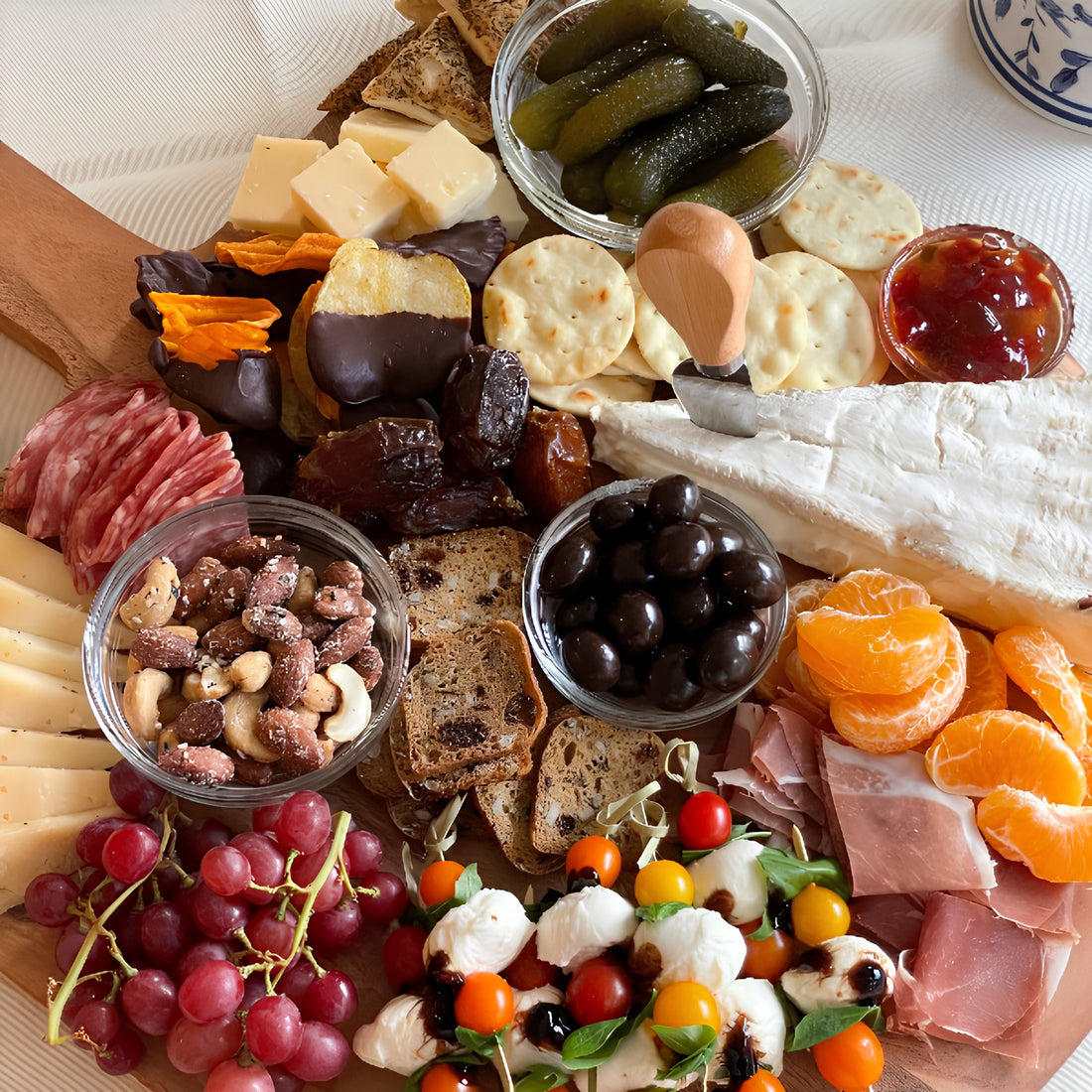 Charcuterie board placed on table