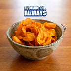 Sweet potato chips in a bowl with the text avocado oil always