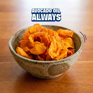 Sweet potato chips in a bowl with the text avocado oil always