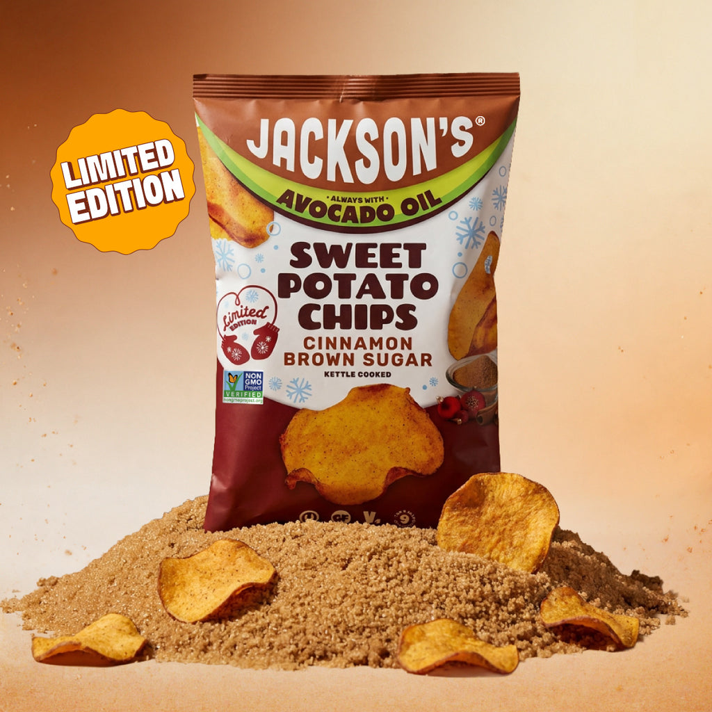 Jackson's Cinnamon Brown Sugar Sweet Potato Chip Front of Bag, limited edition, always with avocado oil, kettle cooked. Non-GMO, Vegan, Gluten Free, Free from the top 9 allergens. Bag on a pile of brown sugar and cinnamon with chips nested and sticking out.