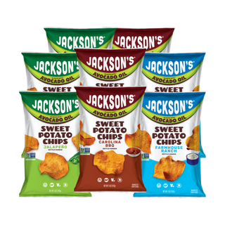 Six bags of Jackson's Sweet Potato Chips arranged in two rows on a plain white background. The front row includes a green Jalapeño bag, a brown Carolina BBQ bag, and a blue Farmhouse Ranch bag.