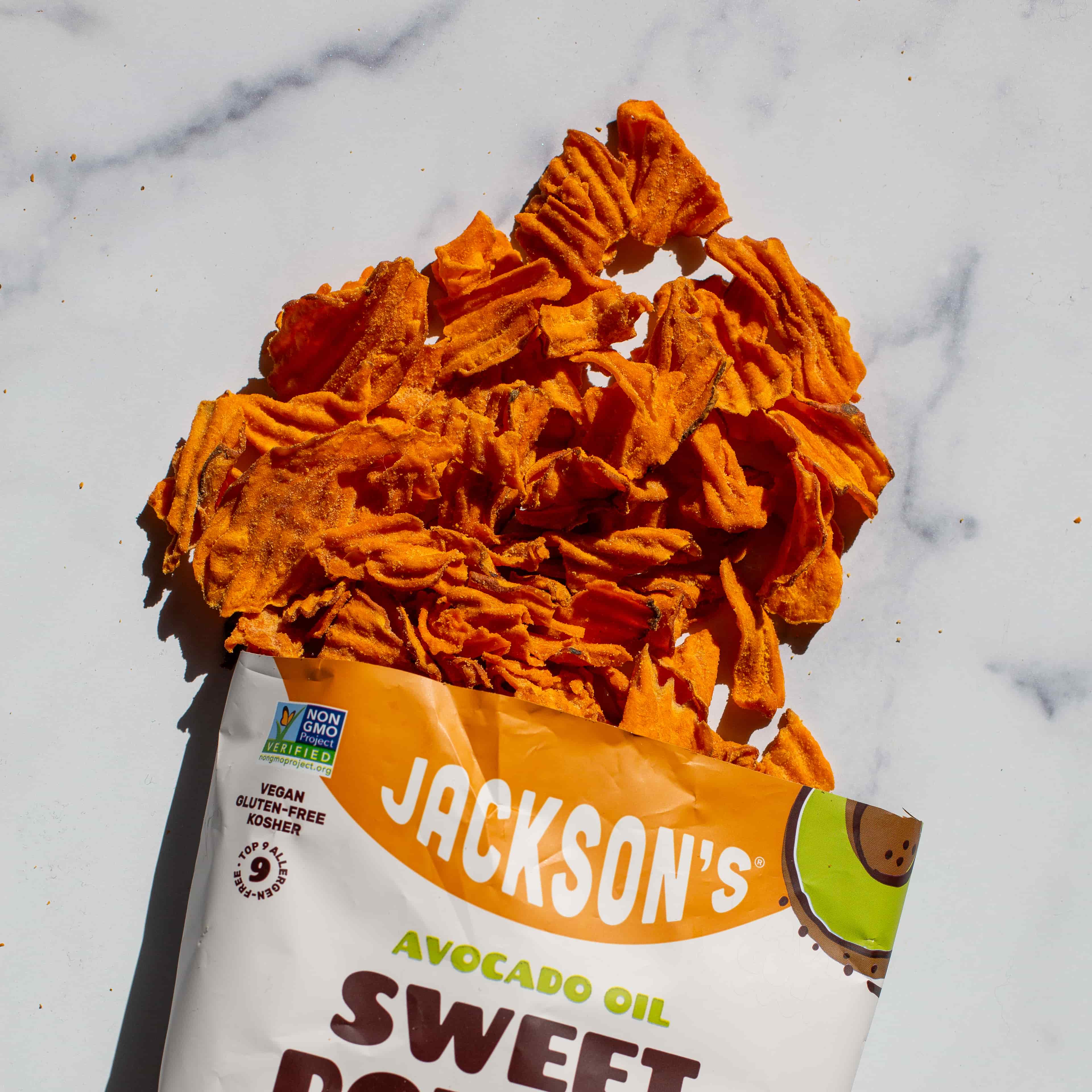 Jackson's Wavy Cut Cheddar & Sour Cream flavored sweet potato chips kettle cooked in avocado oil, dairy-free, vegan, cheddar flavored