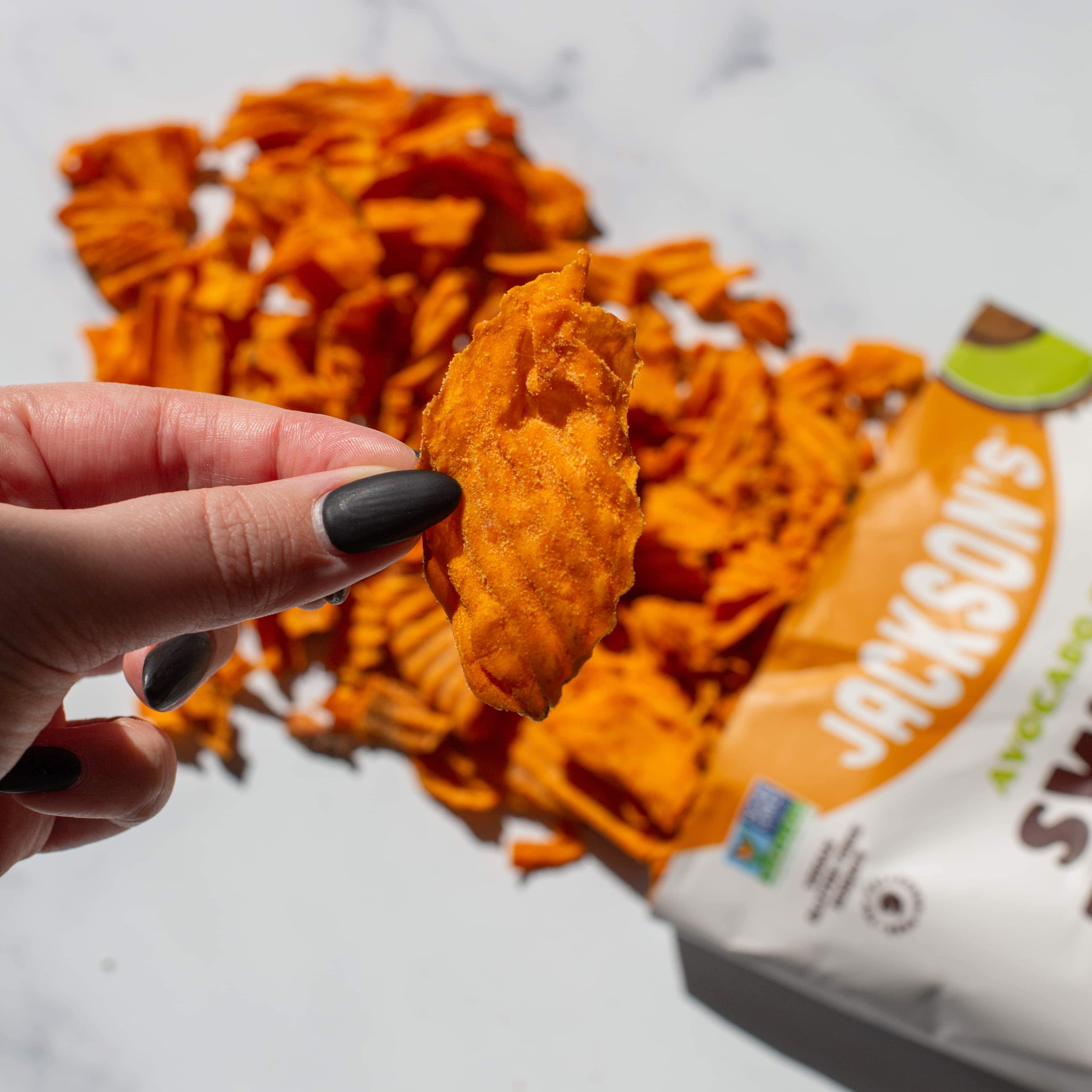 Jackson's Wavy Cut Cheddar & Sour Cream flavored sweet potato chips kettle cooked in avocado oil.